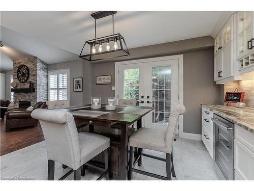 2391 Norland Drive, Burlington, ON - Indoor Photo Showing Dining Room With Fireplace