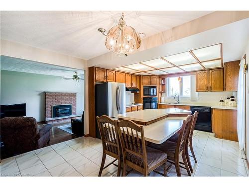 50 Shadeland Crescent, Stoney Creek, ON - Indoor Photo Showing Dining Room With Fireplace