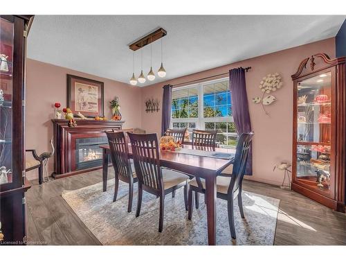 153 Secord St Street, Dunnville, ON - Indoor Photo Showing Dining Room With Fireplace