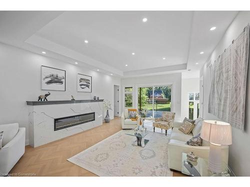 232 Ellis Avenue, Mount Pleasant, ON - Indoor Photo Showing Living Room With Fireplace