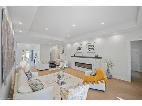 232 Ellis Avenue, Mount Pleasant, ON - Indoor Photo Showing Living Room With Fireplace