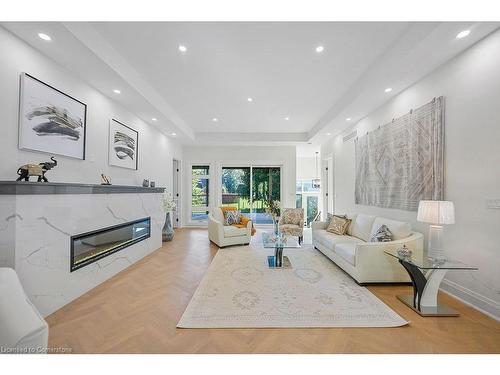 232 Ellis Avenue, Mount Pleasant, ON - Indoor Photo Showing Living Room With Fireplace