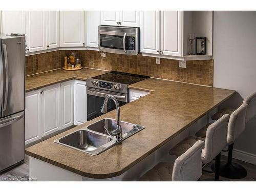 24 Liberty Street, Hamilton, ON - Indoor Photo Showing Kitchen With Double Sink