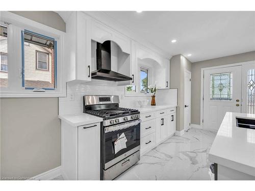 66 Howe Avenue, Hamilton, ON - Indoor Photo Showing Kitchen With Double Sink