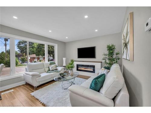 66 Howe Avenue, Hamilton, ON - Indoor Photo Showing Living Room With Fireplace