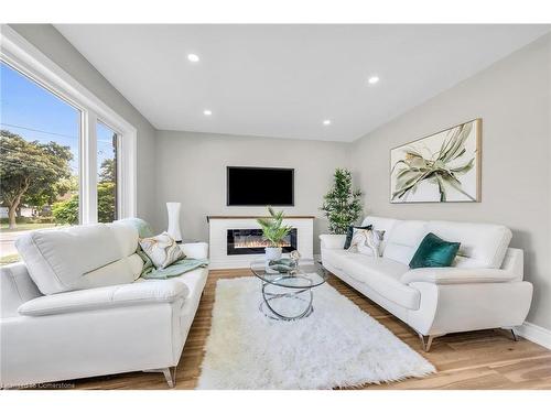 66 Howe Avenue, Hamilton, ON - Indoor Photo Showing Living Room With Fireplace