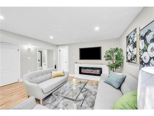 66 Howe Avenue, Hamilton, ON - Indoor Photo Showing Living Room With Fireplace