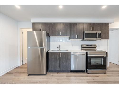 214-4263 Fourth Avenue, Niagara Falls, ON - Indoor Photo Showing Kitchen With Double Sink