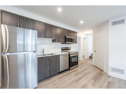 214-4263 Fourth Avenue, Niagara Falls, ON - Indoor Photo Showing Kitchen With Double Sink