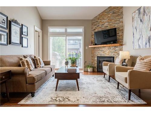 74 Willson Crossing, Fonthill, ON - Indoor Photo Showing Living Room With Fireplace