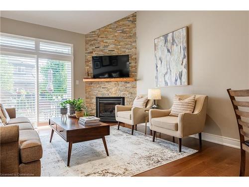 74 Willson Crossing, Fonthill, ON - Indoor Photo Showing Living Room With Fireplace