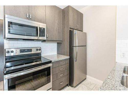 418-118 King Street E, Hamilton, ON - Indoor Photo Showing Kitchen With Stainless Steel Kitchen