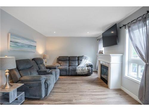 93 Bradley Avenue, Binbrook, ON - Indoor Photo Showing Living Room With Fireplace