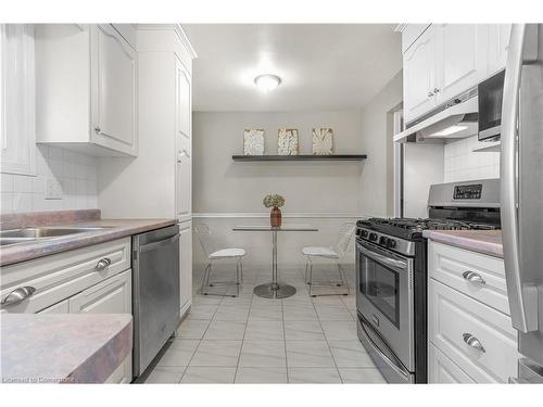 8055 Thorton Street, Niagara Falls, ON - Indoor Photo Showing Kitchen With Double Sink