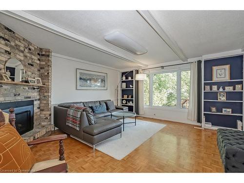 1939 Kerns Road, Burlington, ON - Indoor Photo Showing Living Room With Fireplace