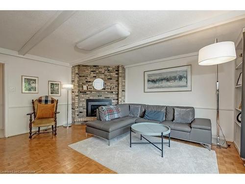 1939 Kerns Road, Burlington, ON - Indoor Photo Showing Living Room With Fireplace