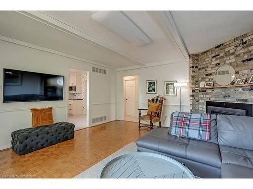 1939 Kerns Road, Burlington, ON - Indoor Photo Showing Living Room With Fireplace