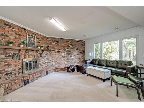 1939 Kerns Road, Burlington, ON - Indoor Photo Showing Living Room With Fireplace