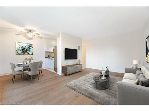 101-81 Charlton Street E, Hamilton, ON - Indoor Photo Showing Living Room