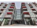 A527-5230 Dundas Street, Burlington, ON  - Outdoor With Balcony With Facade 