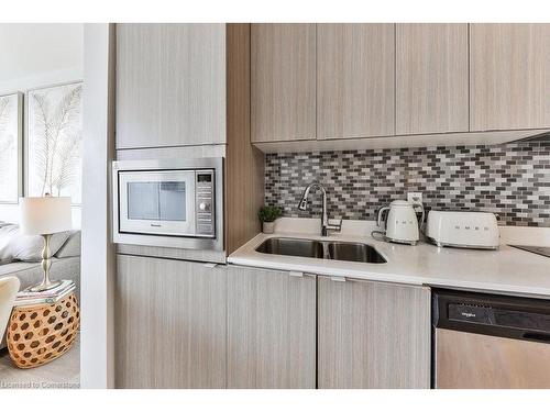 A527-5230 Dundas Street, Burlington, ON - Indoor Photo Showing Kitchen With Double Sink With Upgraded Kitchen