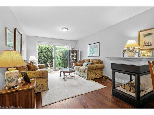 30-3045 New Street, Burlington, ON - Indoor Photo Showing Living Room With Fireplace