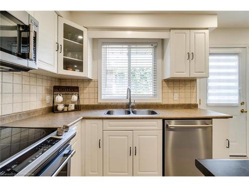 3448 Caplan Crescent, Burlington, ON - Indoor Photo Showing Kitchen With Double Sink