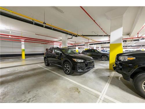 1401-385 Winston Road, Grimsby, ON - Indoor Photo Showing Garage