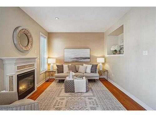 7 Millhouse Mews, Brampton, ON - Indoor Photo Showing Living Room With Fireplace