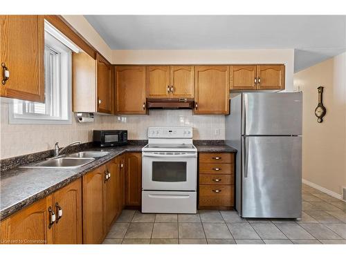 76 Braemar Avenue, Caledonia, ON - Indoor Photo Showing Kitchen With Double Sink