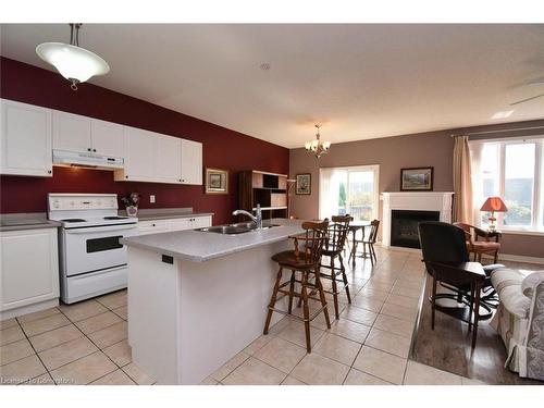 11 Sidare Court, Grimsby, ON - Indoor Photo Showing Kitchen With Fireplace