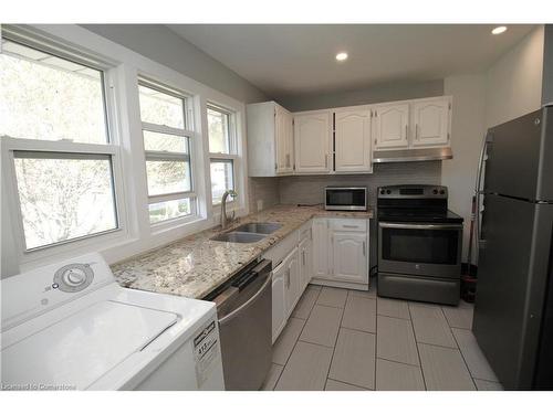 11 Woodman Drive, Brantford, ON - Indoor Photo Showing Kitchen With Double Sink