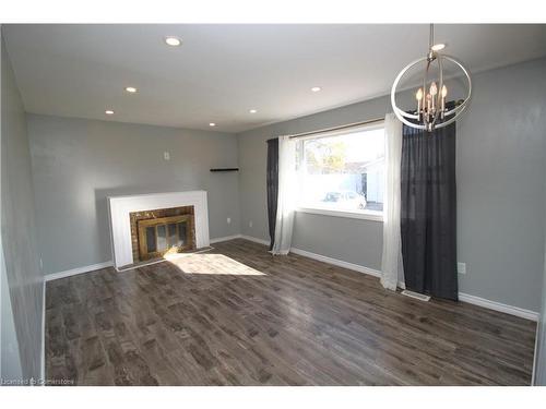 11 Woodman Drive, Brantford, ON - Indoor Photo Showing Living Room With Fireplace