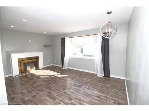 11 Woodman Drive, Brantford, ON - Indoor Photo Showing Living Room With Fireplace