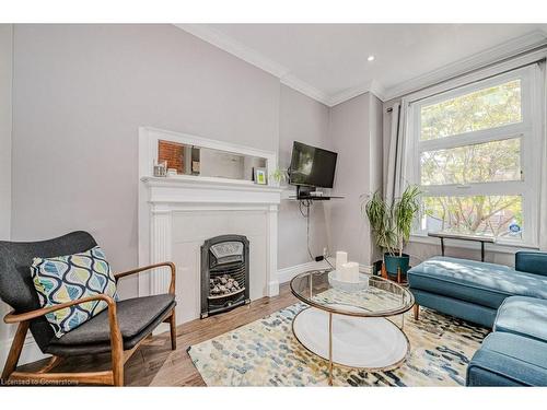 90 Peter Street, Hamilton, ON - Indoor Photo Showing Living Room With Fireplace