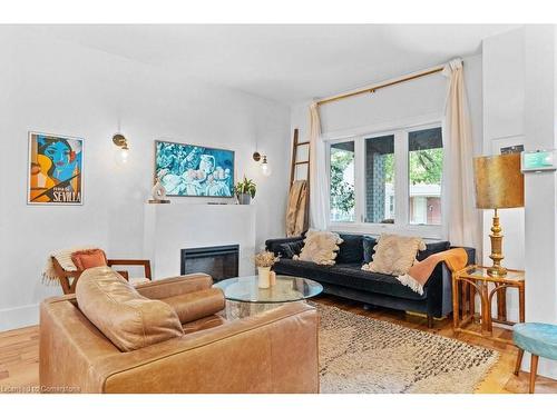 120 Gibson Avenue, Hamilton, ON - Indoor Photo Showing Living Room With Fireplace