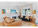 120 Gibson Avenue, Hamilton, ON  - Indoor Photo Showing Living Room With Fireplace 