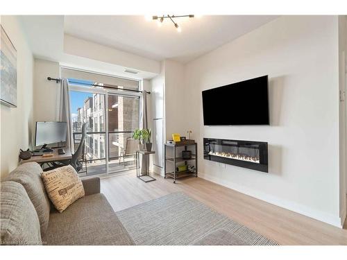 524-600 North Service Road, Stoney Creek, ON - Indoor Photo Showing Living Room With Fireplace