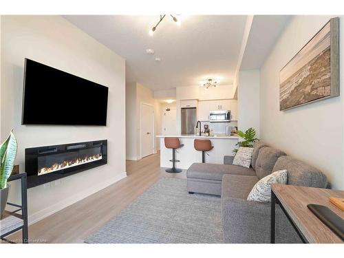 524-600 North Service Road, Stoney Creek, ON - Indoor Photo Showing Living Room With Fireplace