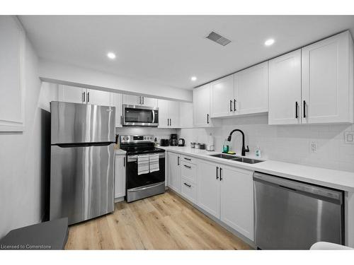 830 Mohawk Road E, Hamilton, ON - Indoor Photo Showing Kitchen With Stainless Steel Kitchen With Double Sink