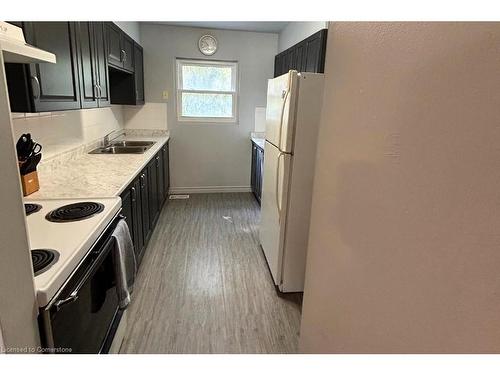 B-509 Weber Street N, Waterloo, ON - Indoor Photo Showing Kitchen With Double Sink