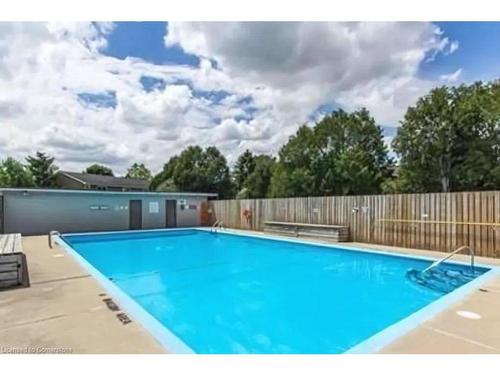 B-509 Weber Street N, Waterloo, ON - Outdoor With In Ground Pool With Backyard