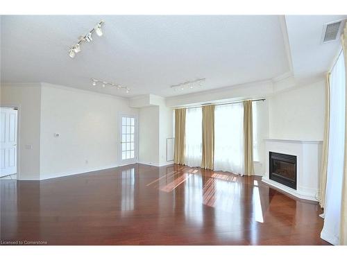 603-60 Old Mill Road, Oakville, ON - Indoor Photo Showing Other Room With Fireplace