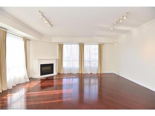 603-60 Old Mill Road, Oakville, ON - Indoor Photo Showing Other Room With Fireplace