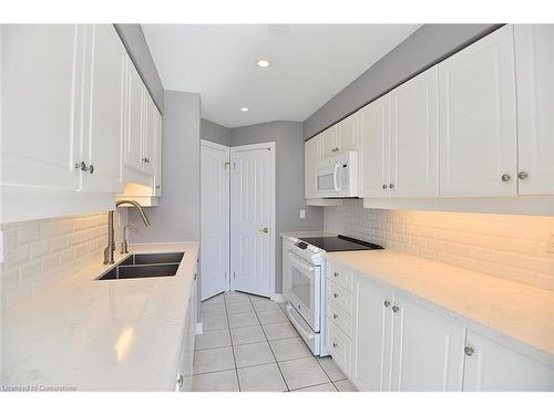 603-60 Old Mill Road, Oakville, ON - Indoor Photo Showing Kitchen With Double Sink