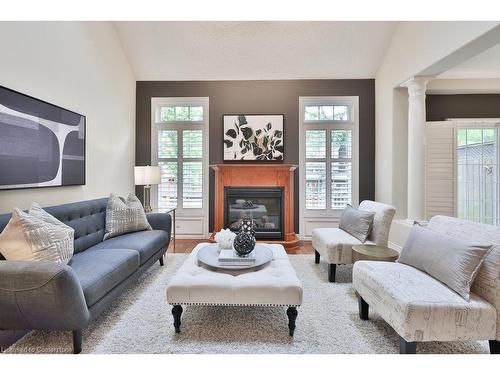 24-289 Plains Road W, Burlington, ON - Indoor Photo Showing Living Room With Fireplace