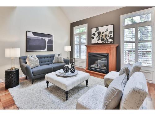 24-289 Plains Road W, Burlington, ON - Indoor Photo Showing Living Room With Fireplace