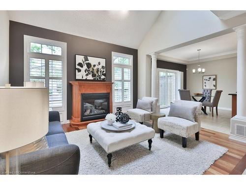 24-289 Plains Road W, Burlington, ON - Indoor Photo Showing Living Room With Fireplace