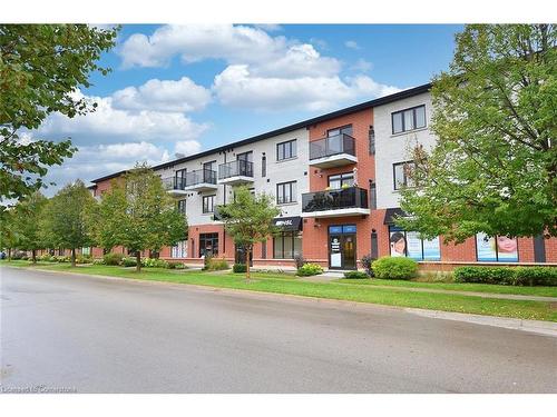 320-170 Rockhaven Lane, Waterdown, ON - Outdoor With Balcony With Facade