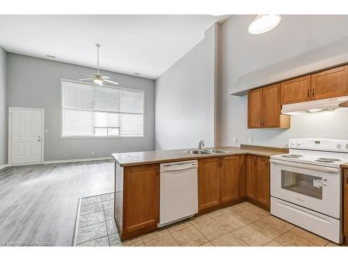 214-111 Grey Street, Brantford, ON - Indoor Photo Showing Kitchen With Double Sink